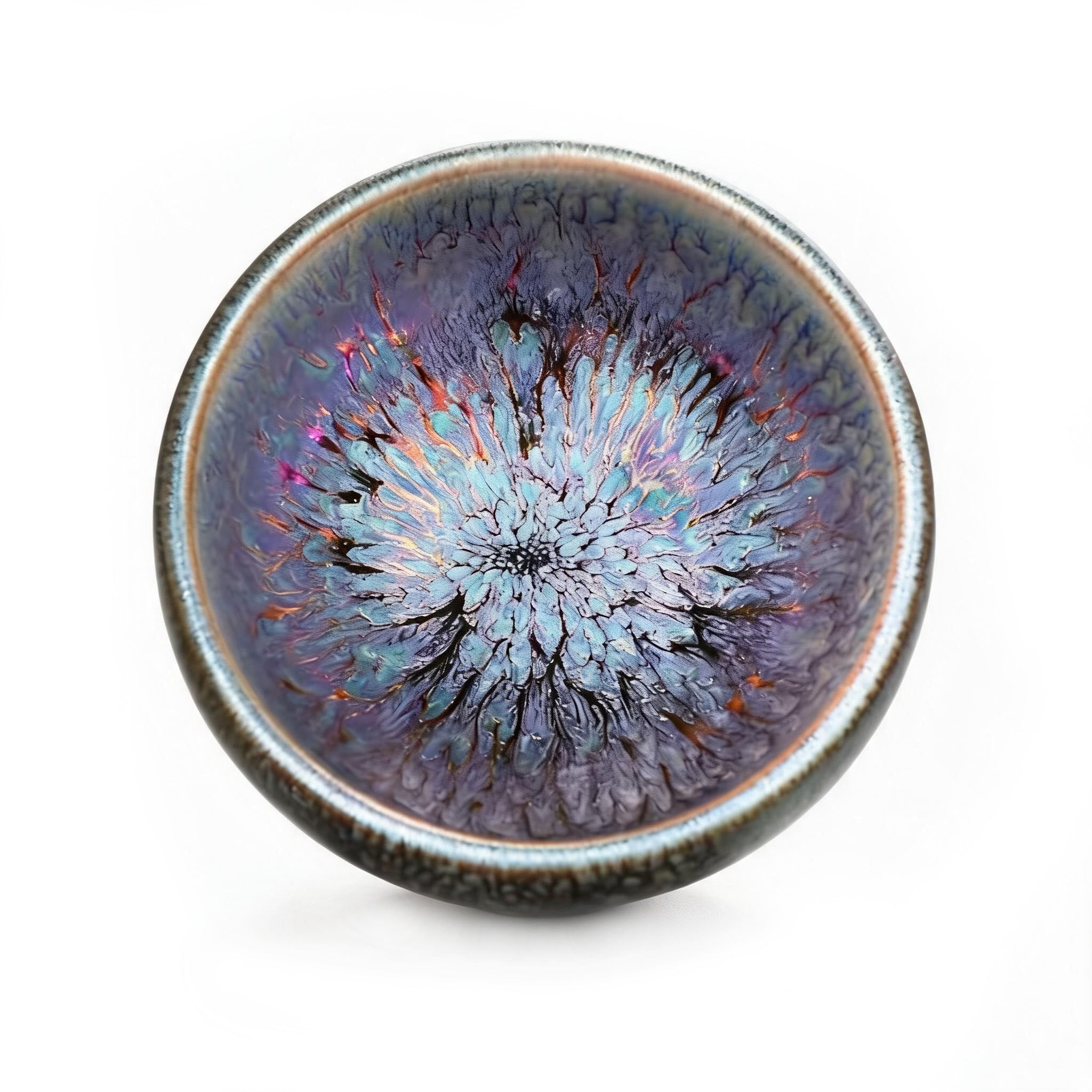 Zen tea ceremony featuring the Iridescent Bloom Jian Zhan teacup with traditional green tea.